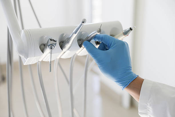 Professional Tooth Extraction technician working in Danville, IN